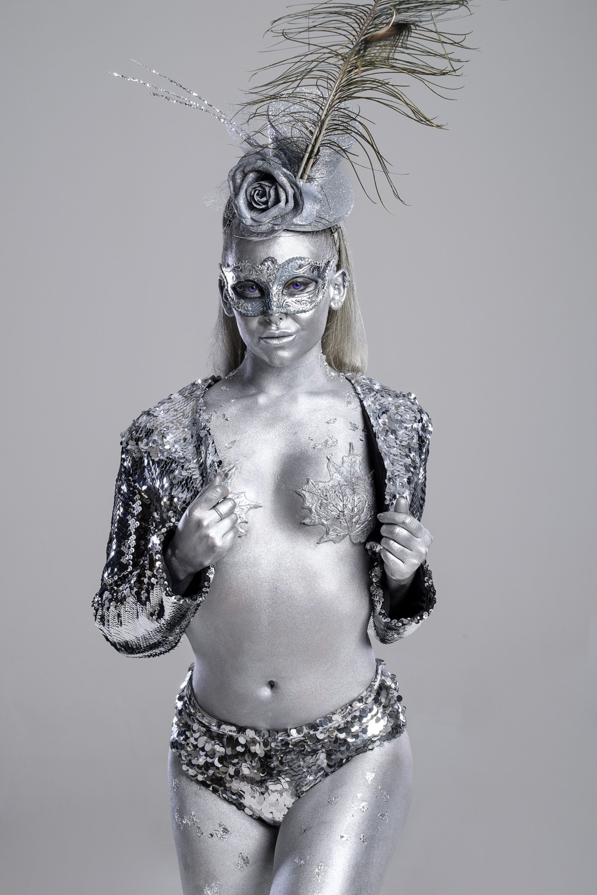 silver body painted female dancer model for circus events
