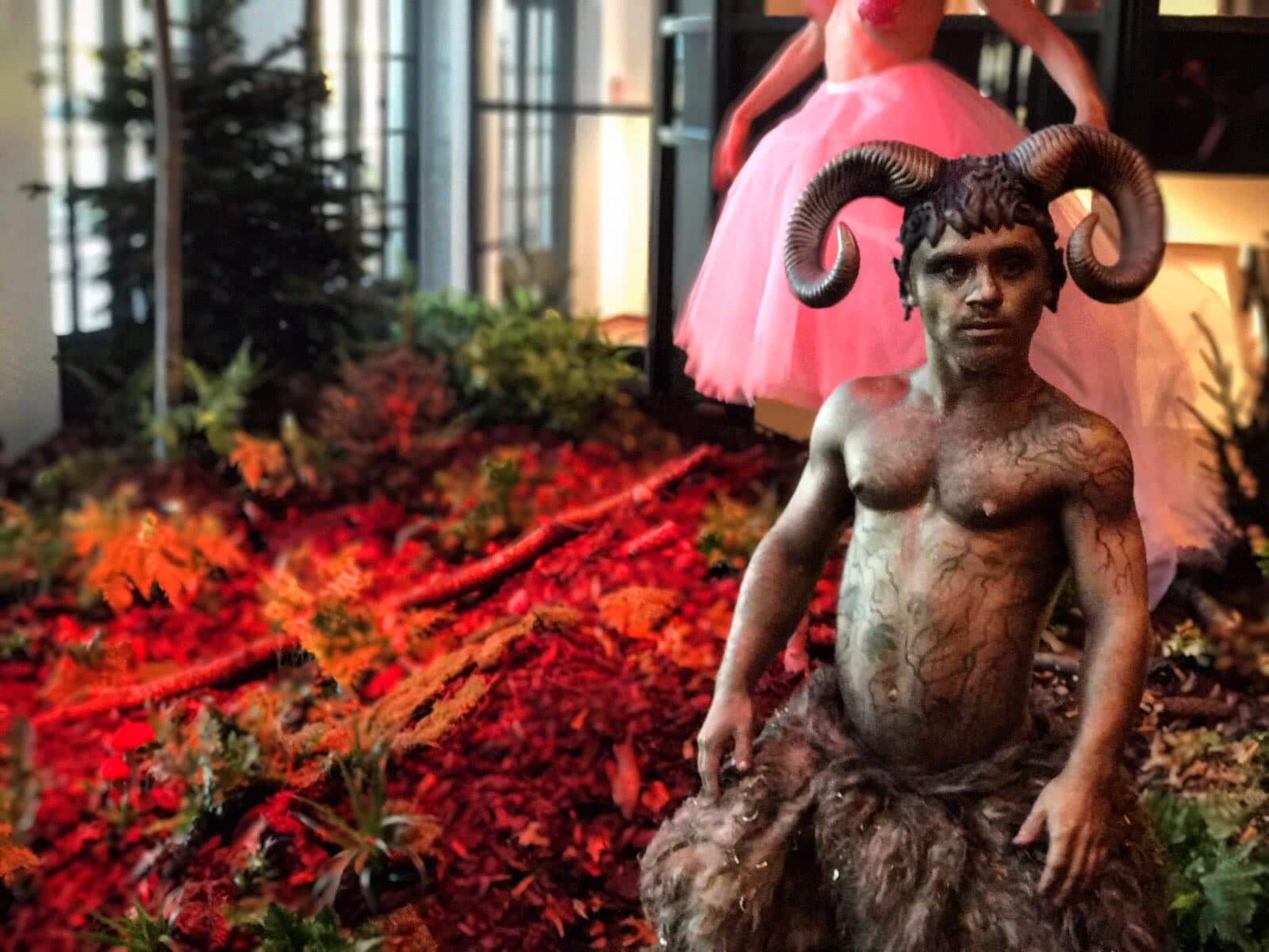 Gold body painted faun little person for events hire book