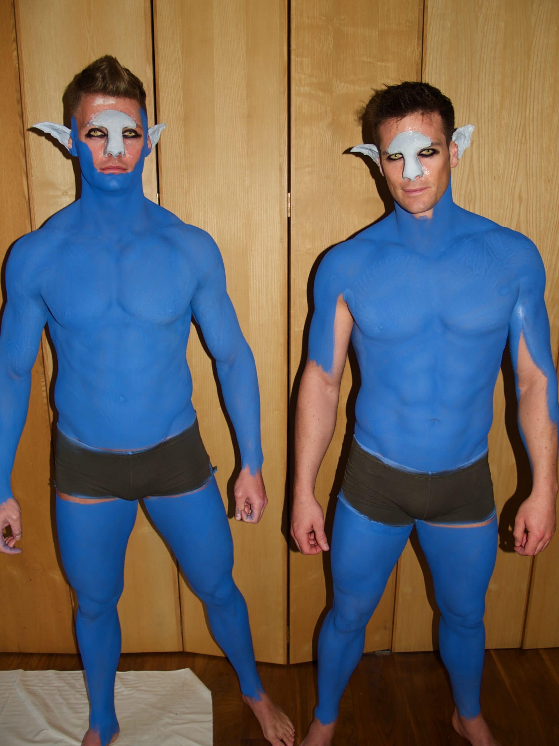 Body painted performers male muscle fitness models in underwear behind the scenes