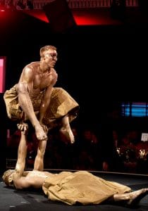 Gold body painted acrobats