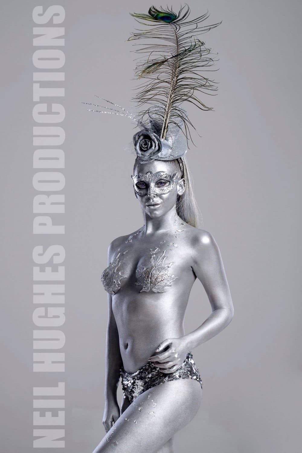 Female silver body painting Body painting bathing suits