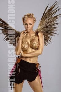 Golden body painted female model