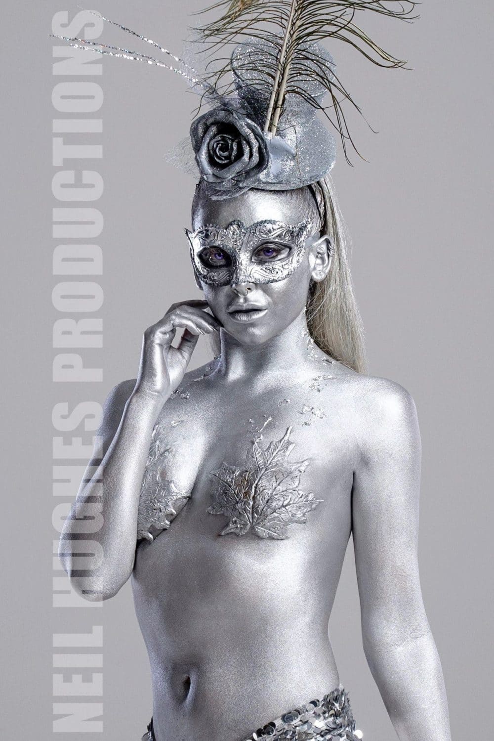 Female silver body painting Body painted dancers