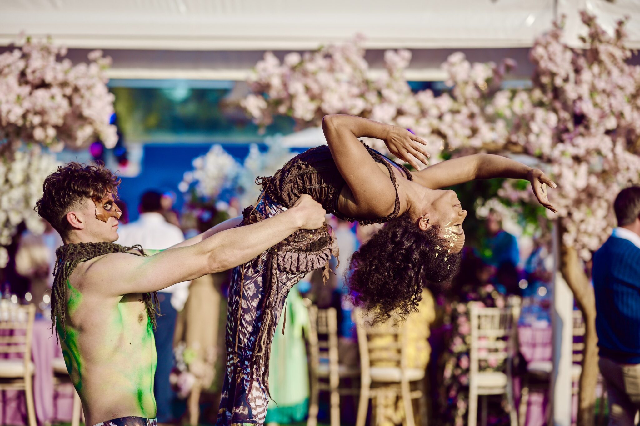 Enchanted Garden Acrobalance Duo Two acro-balance circus performers dressed in costume at a summer garden party
