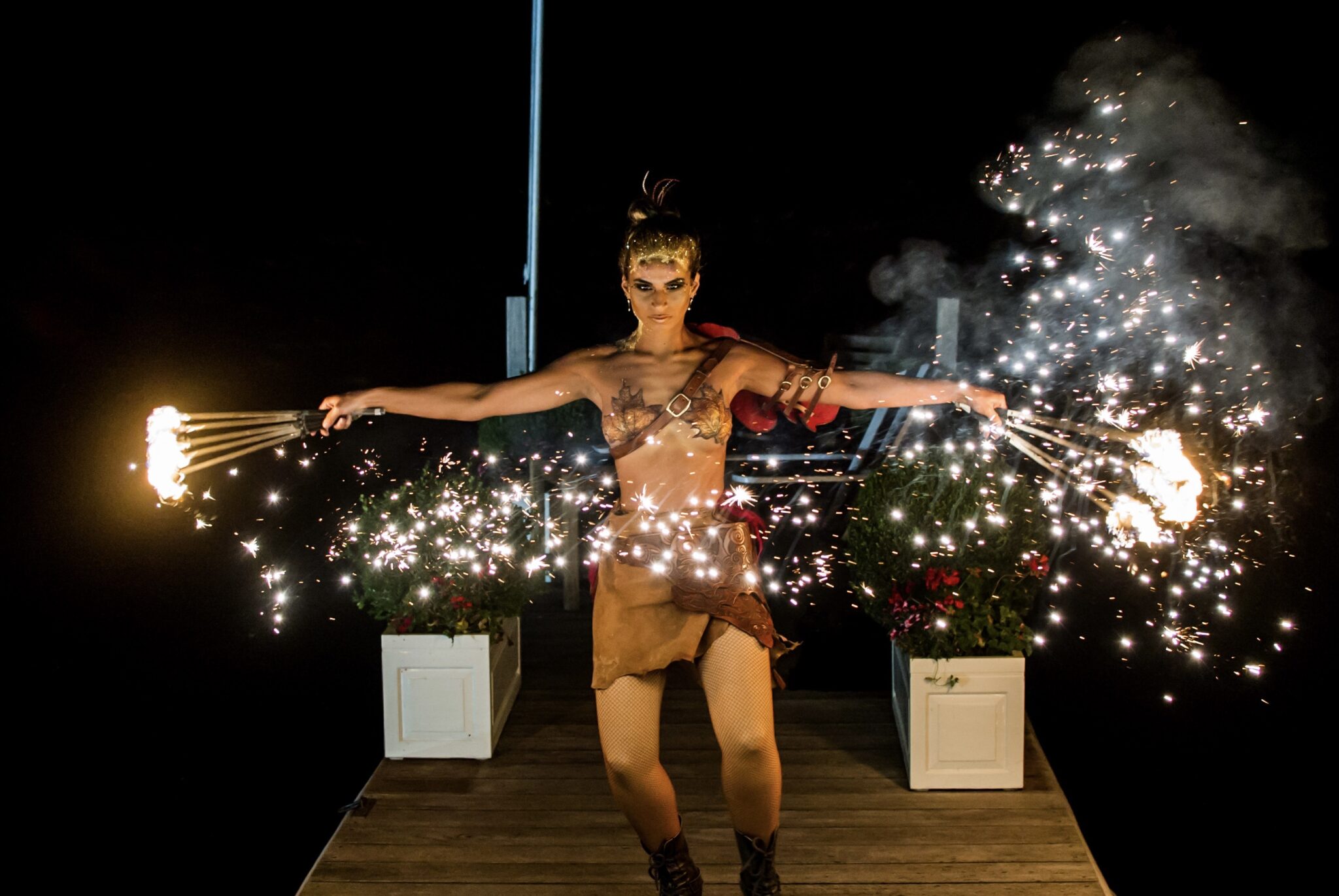 Bambi Fire Performer Photo of a fire breathing circus performer at dusk dressed as a faun