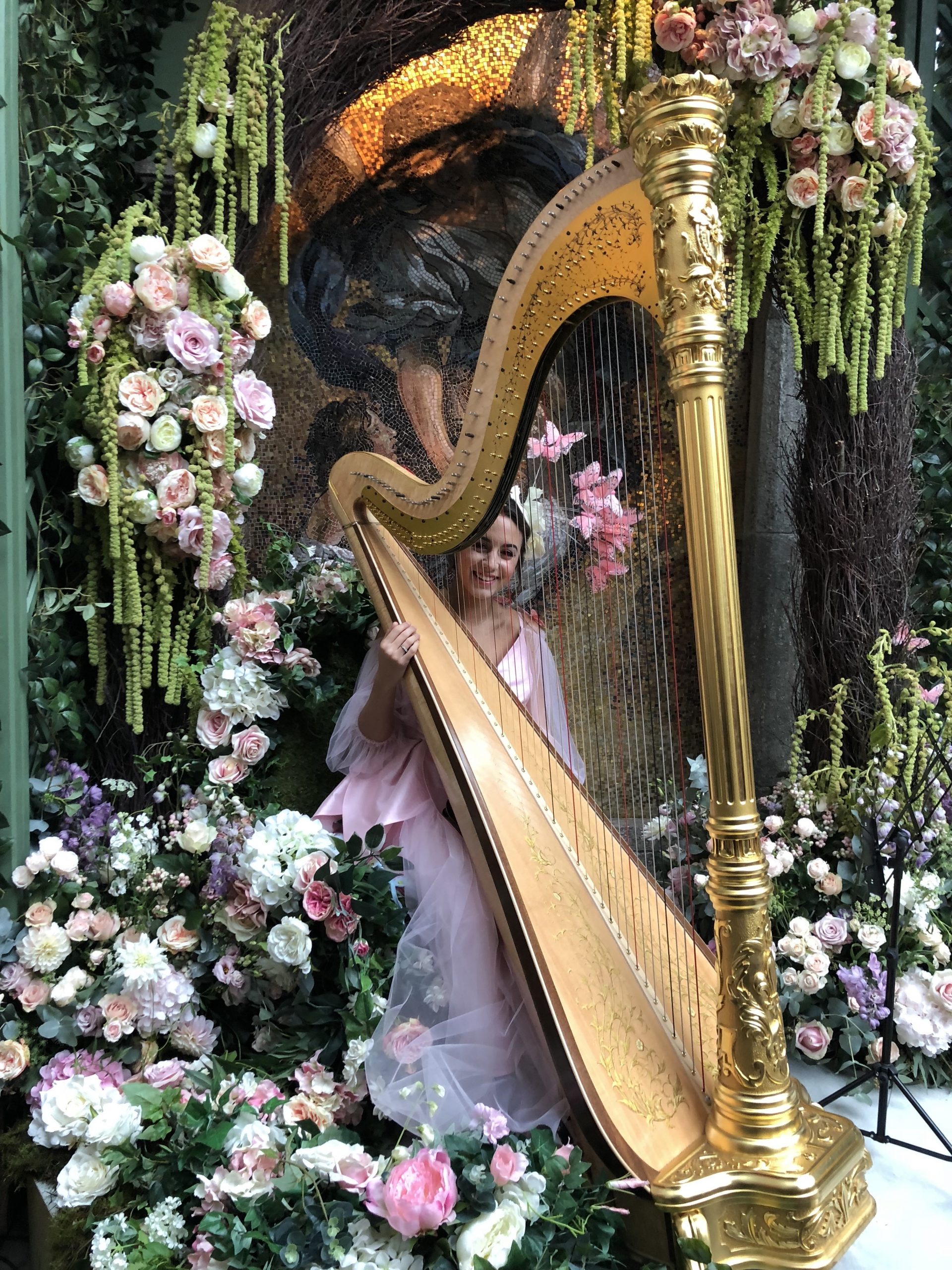 Butterfly Harpist for events enchanted garden florals
