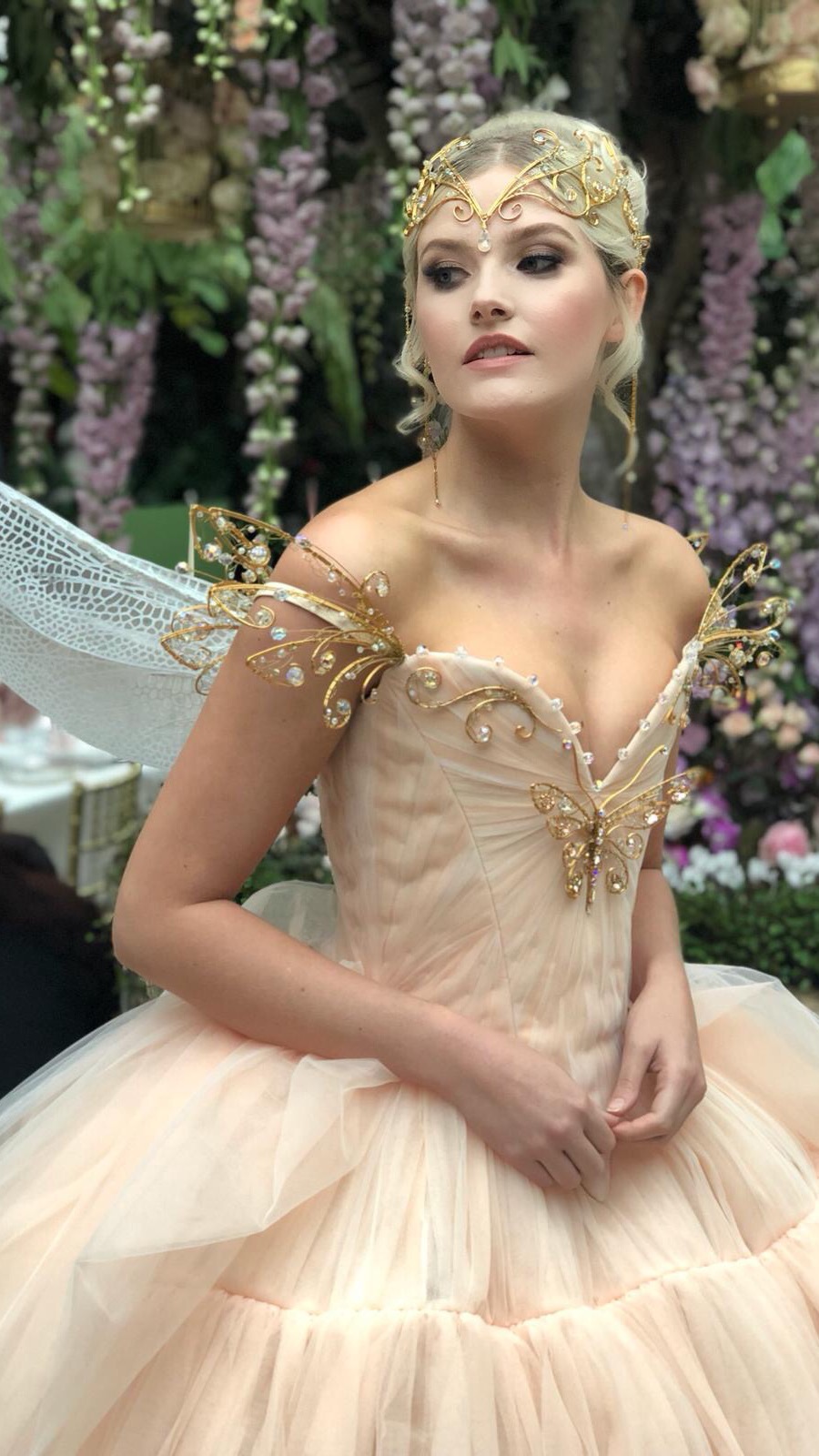 A fairy in an enchanted fairy tale garden wedding